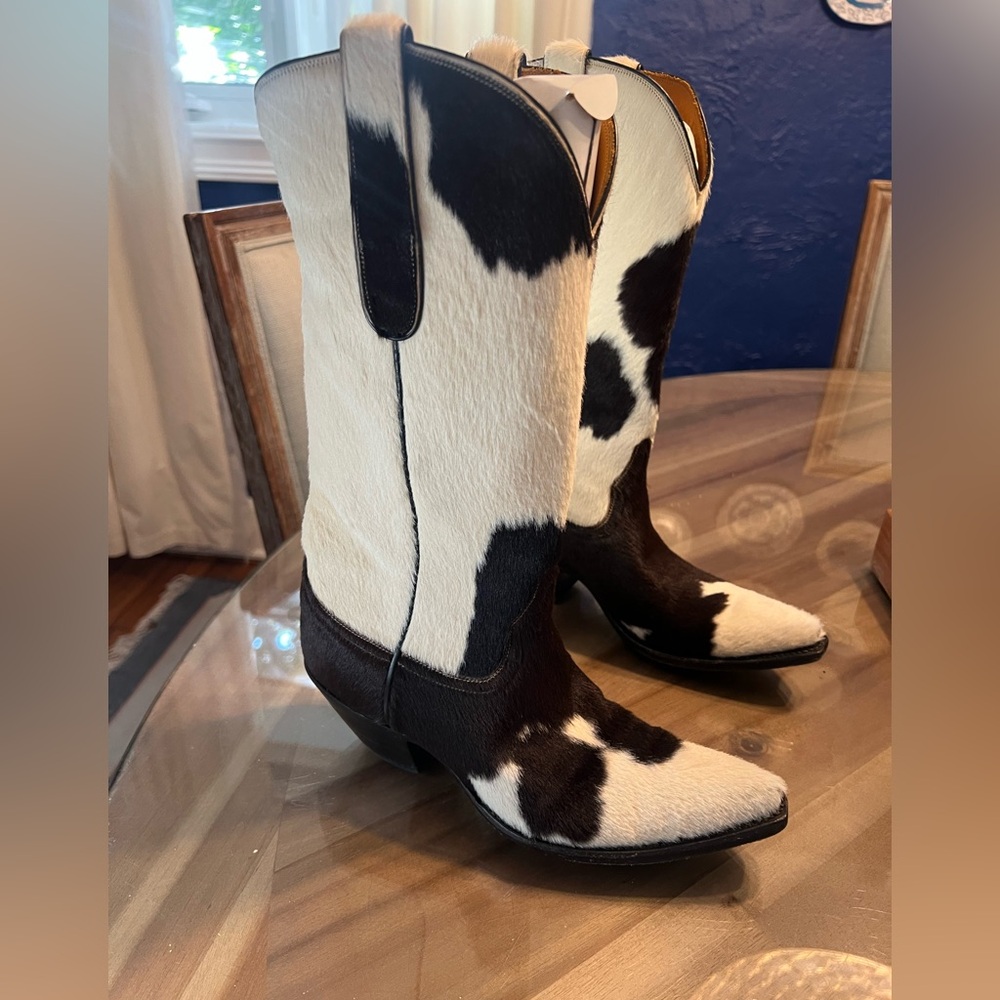 Black and White Heeled Boots with Striking Design